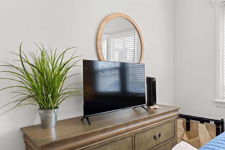 Bedroom with queen bed and Smart TV