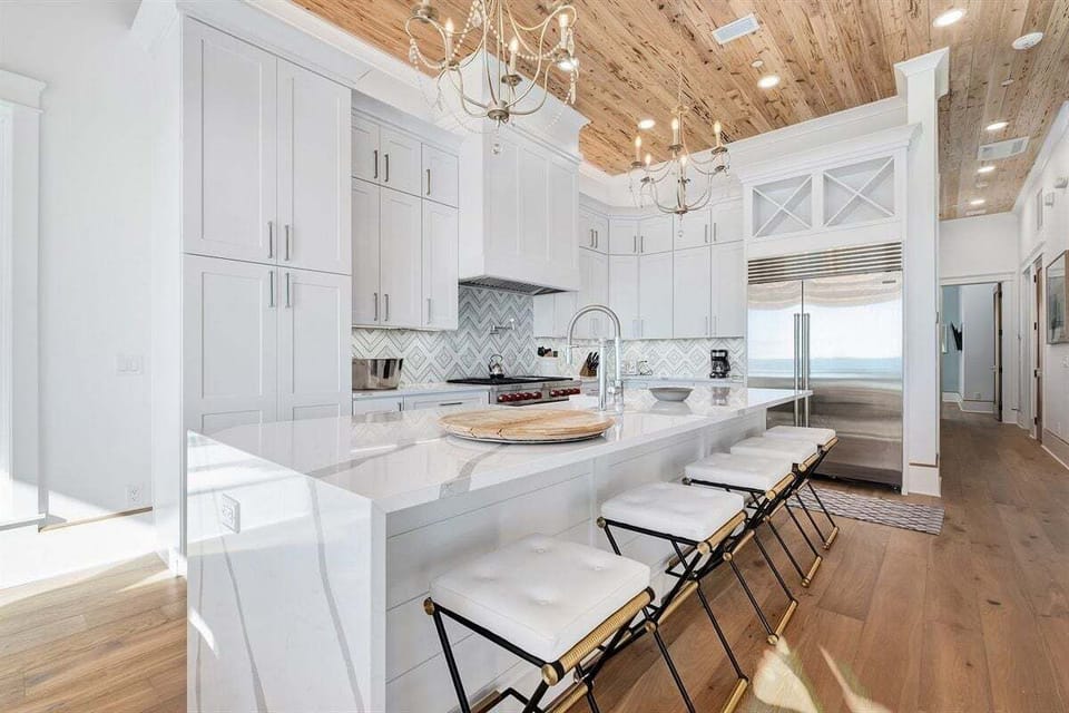 Fully-equipped kitchen with a kitchen island seating for five