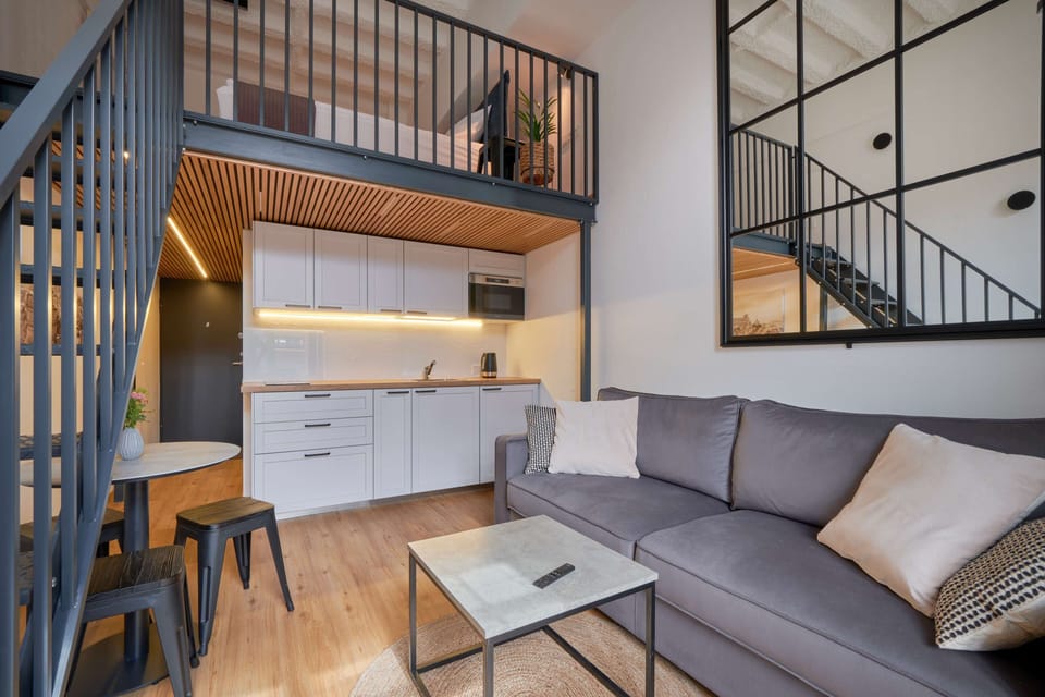 City Loft | 1 bedroom, premium bedding, laptop workspace, blackout drapes