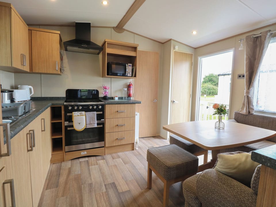 Fridge, electric kettle, toaster, cookware/dishes/utensils