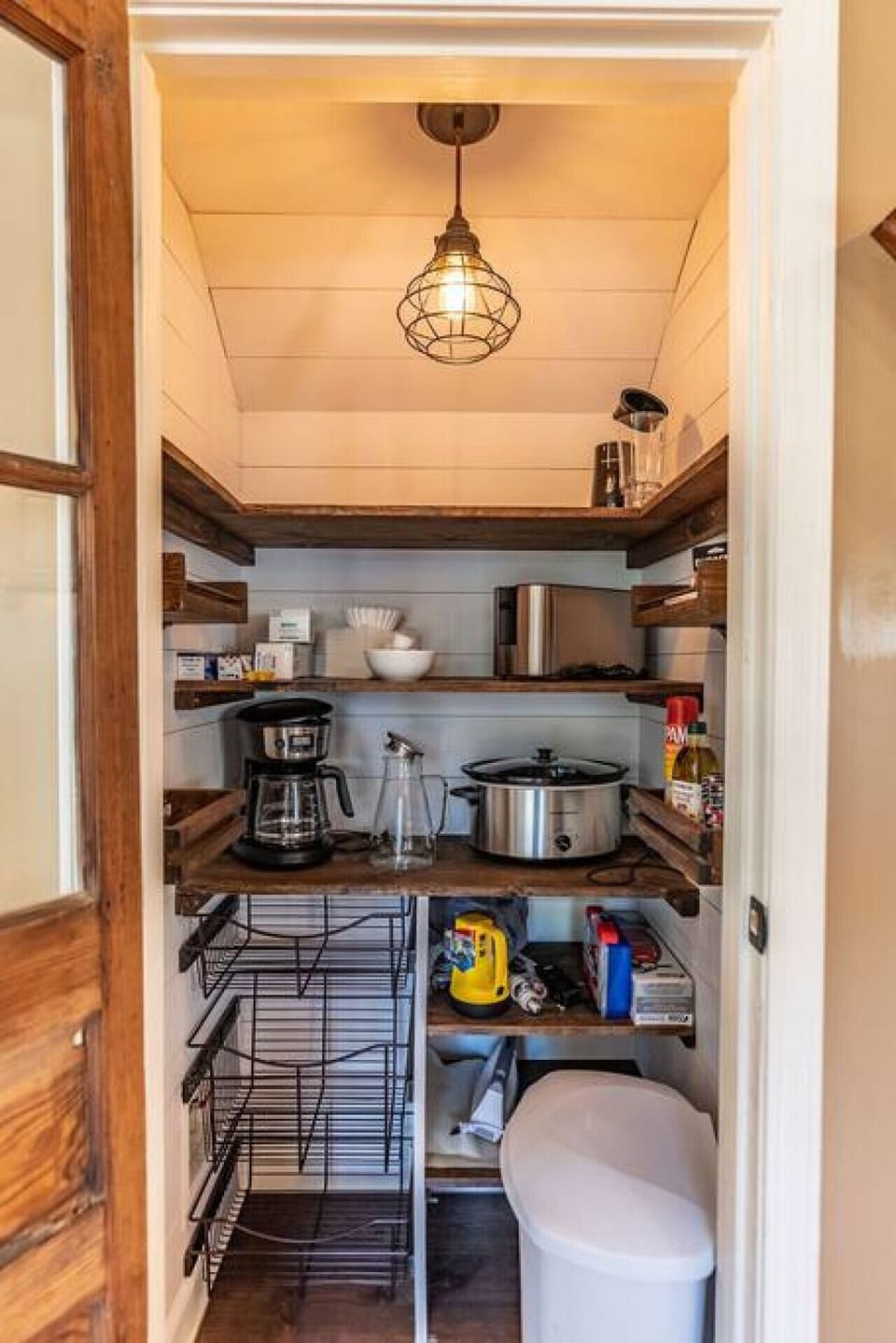 Large pantry with additional cookware and supplies