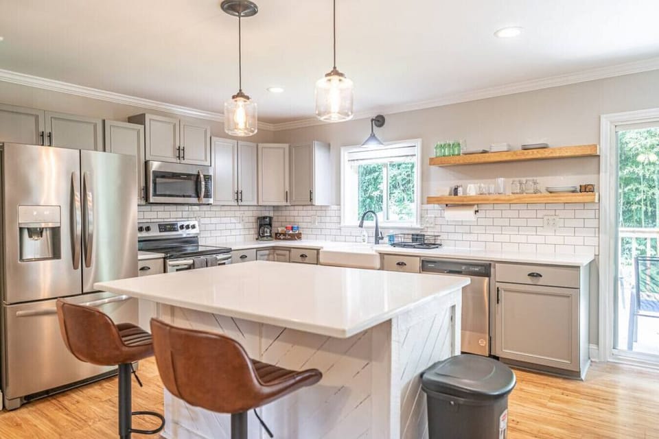 Fully equipped kitchen overlooking the back yard