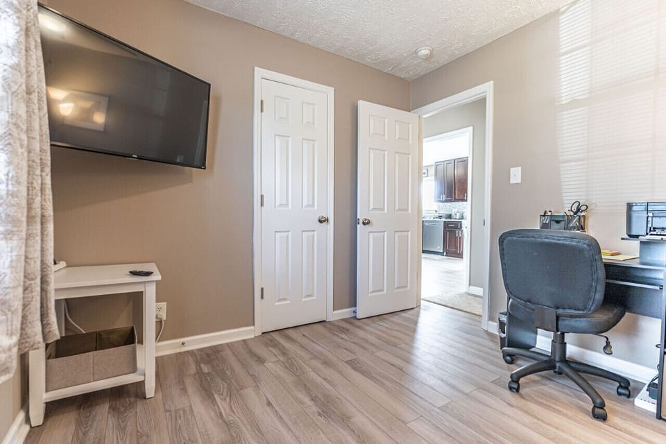 Private office equipped with a printer and all the essentials for a quick, productive work session.