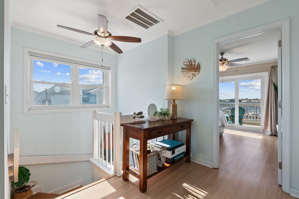 Landing on upper level leads to three bedrooms