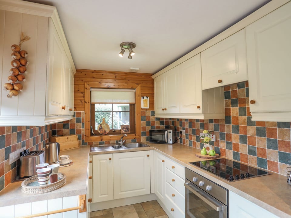 Cottage | Private kitchen | Fridge, dishwasher, electric kettle, toaster