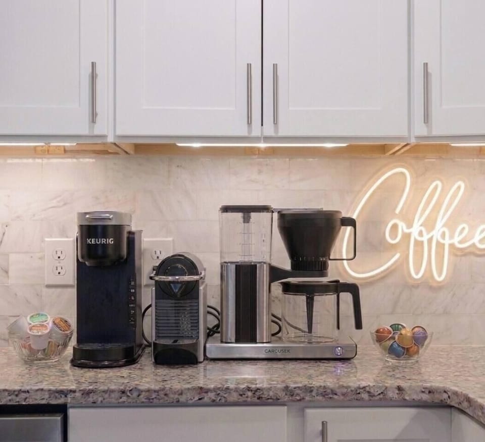 We provide some Starbucks K-Cups, sugar, Splenda, and cream, and some Nespresso pods