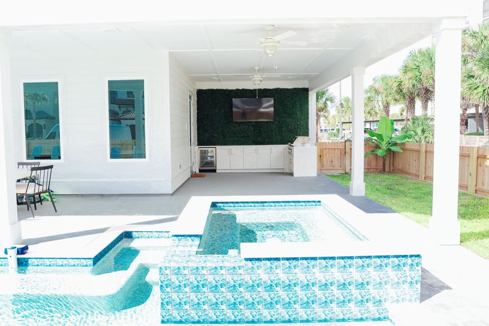 Hot tub pool and Tv/grill area