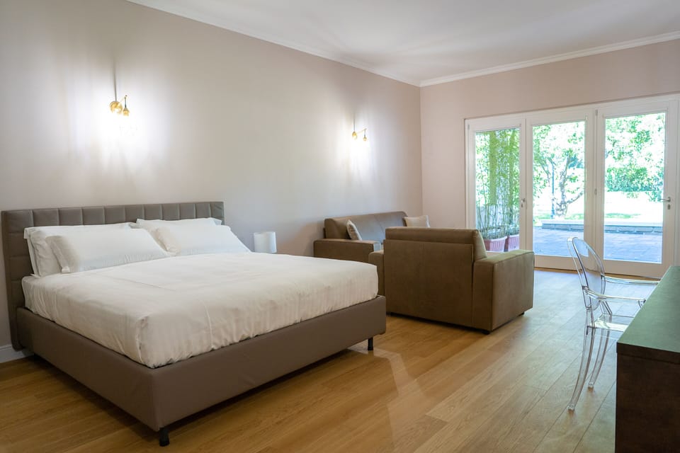 Family Room, Garden View | In-room safe, desk, soundproofing, free WiFi