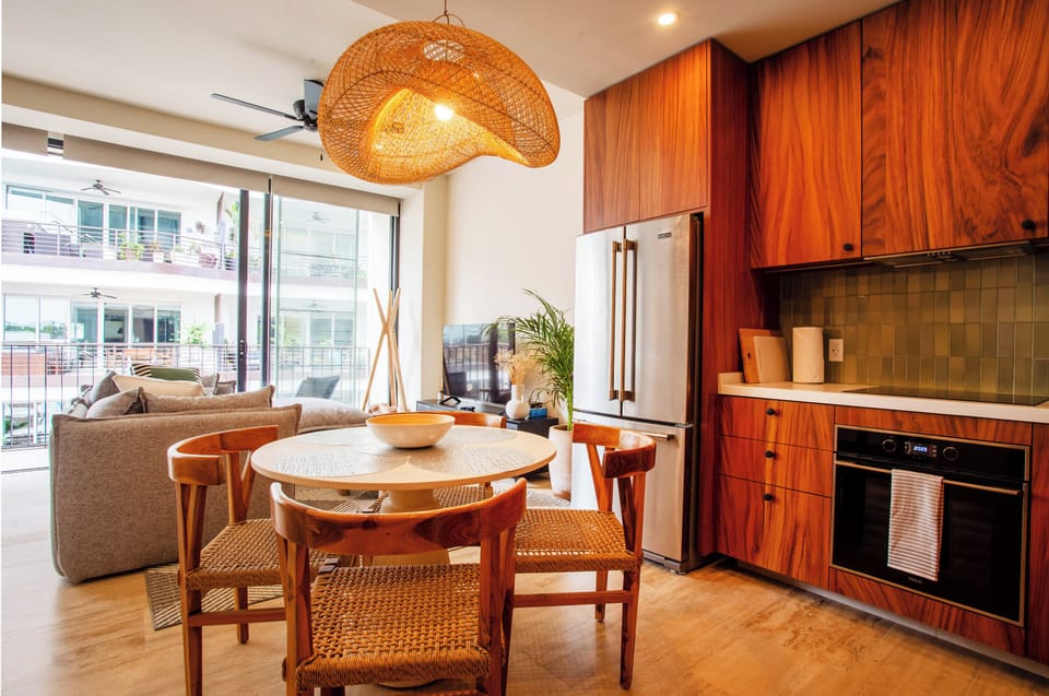 Kitchen amenities include a refrigerator, oven, stove and microwave