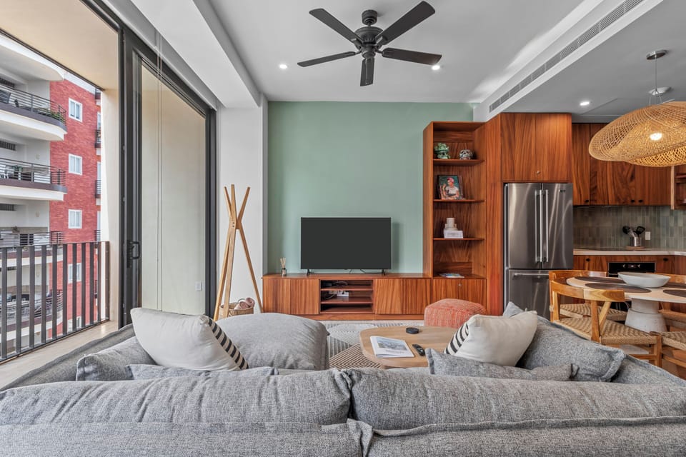 You can watch the smart TV from the sofa or the bed