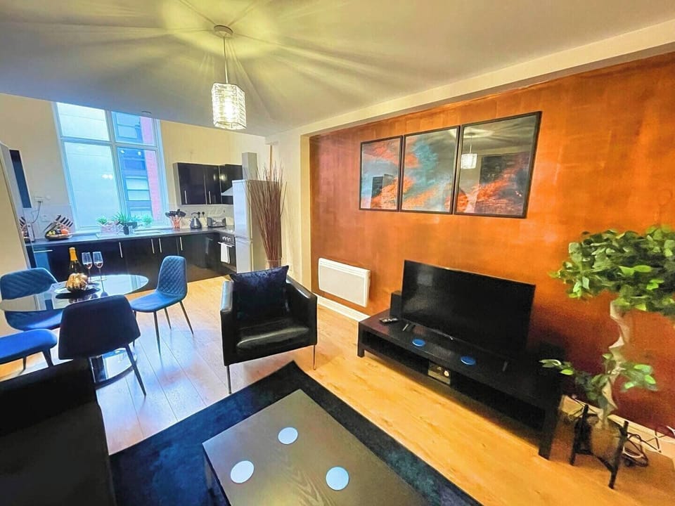 Standard Apartment | Living area | 40-inch LCD TV with cable channels