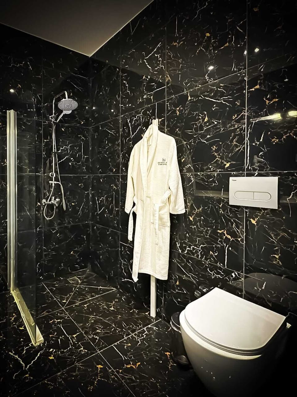 Basic Room, Non Smoking | Bathroom | Shower, rainfall showerhead, hair dryer, slippers