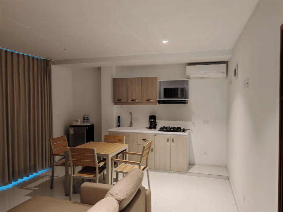 Family Apartment, 1 Bedroom | Living area | 43-inch flat-screen TV with digital channels
