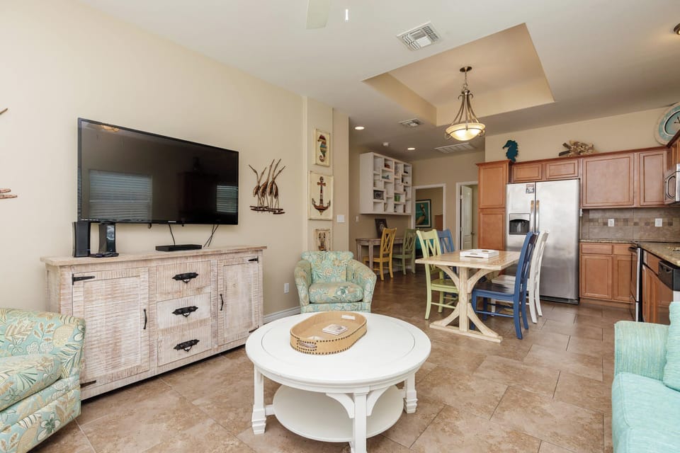 Townhome, Multiple Beds, Kitchen, Pool View (Callie's Cove) | Living area | 42-inch flat-screen TV with digital channels, TV