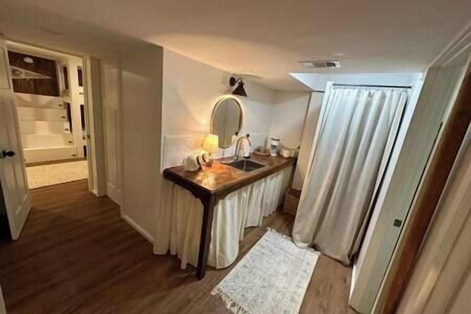 Downstairs laundry room, kitchenette and hallway