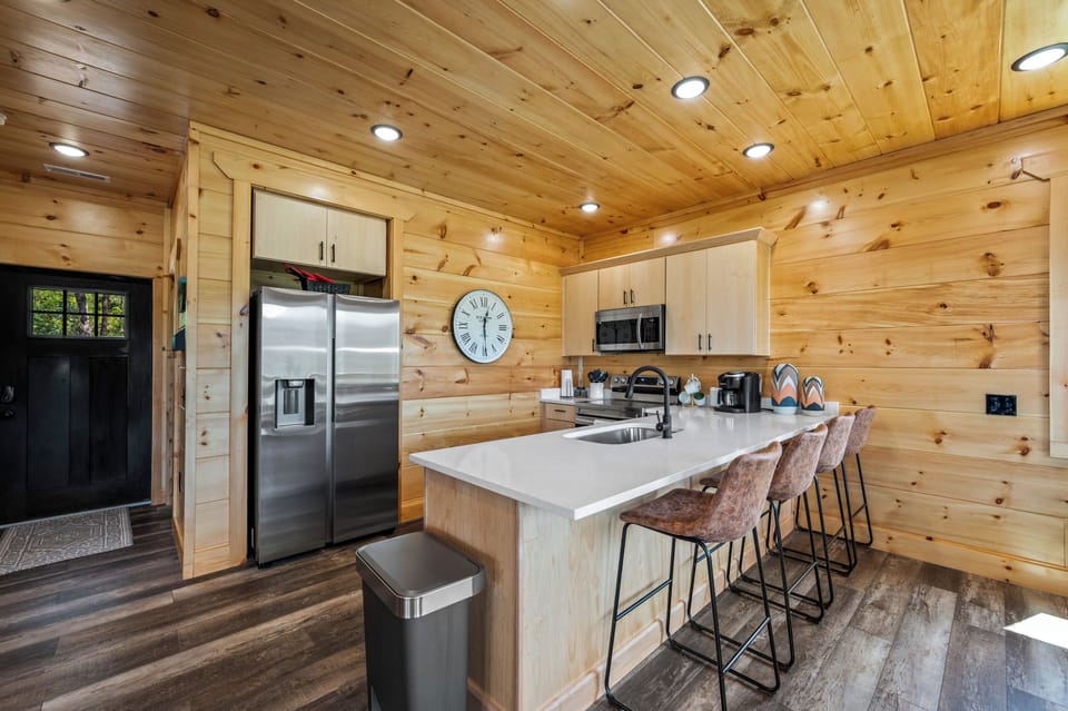 Kitchen with eat in bar for 4