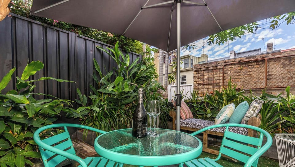 Private outside courtyard with shade umbrella