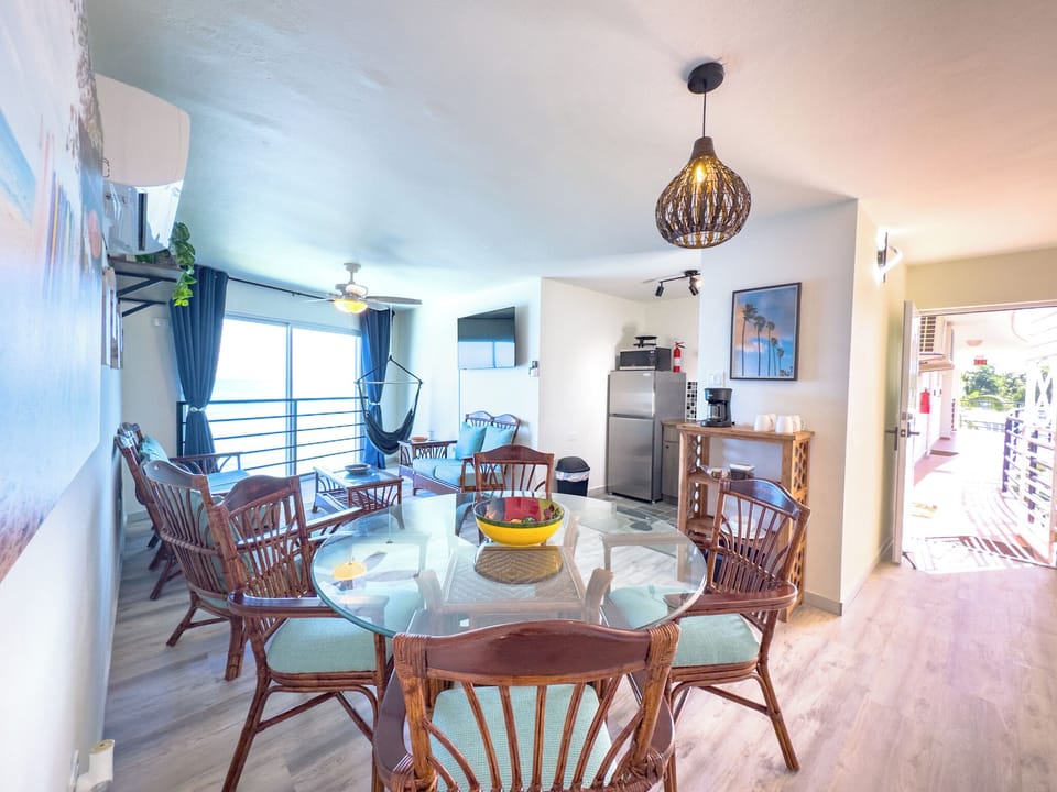 Dining Area: Vibrant space with ocean views, perfect for meals and laughter with loved ones!