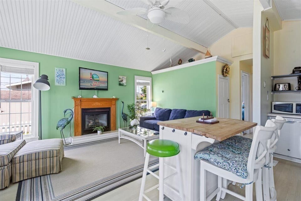 High Ceilings make this adorable Cottage feel light, bright, and spacious.