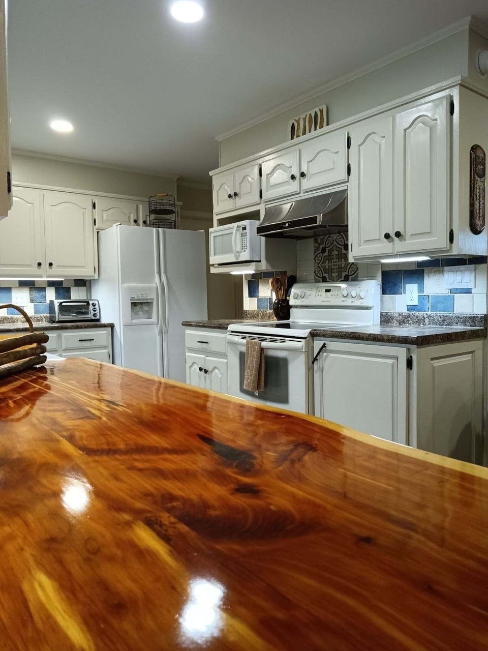Large stocked kitchen for cooking with serving bar