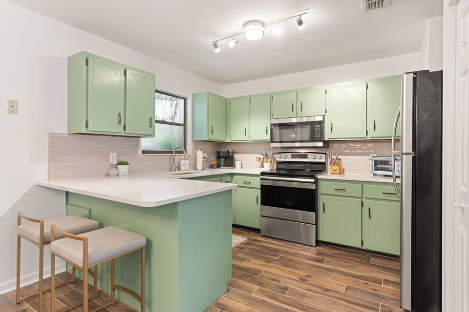 Fully stocked kitchen with Keurig (some coffee included), spices, Alexa speaker