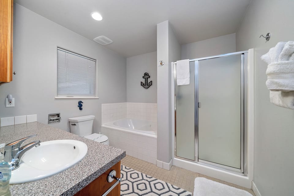 Downstairs main floor bath with Tub and Stall shower.