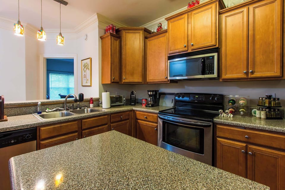 Condo, 2 Queen Beds, Balcony, Garden View (Low Country Dawg House) | Private kitchen | Fridge, microwave, oven, stovetop