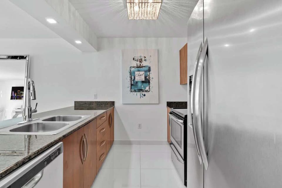 Fully stocked kitchen with complete set of cookware.
