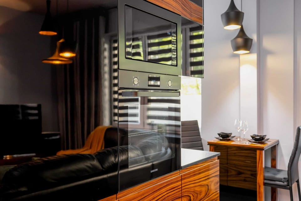 Close-up of a stylish kitchenette with high-quality appliances.