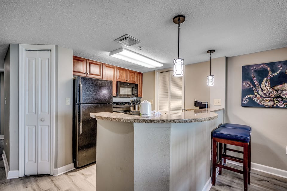Full kitchen with granite countertops