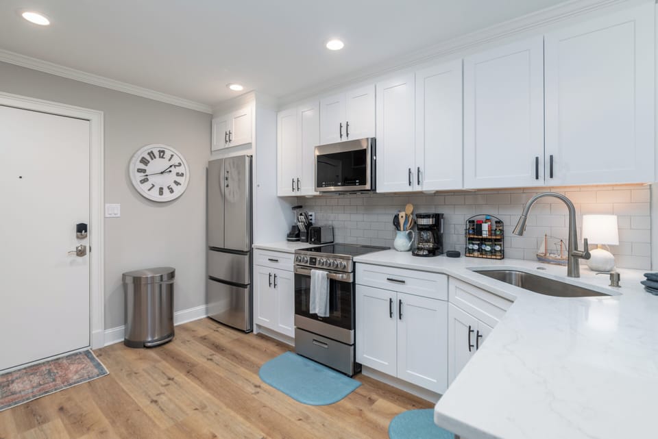 Updated kitchen fully stocked with dishes, pots, pans and more!