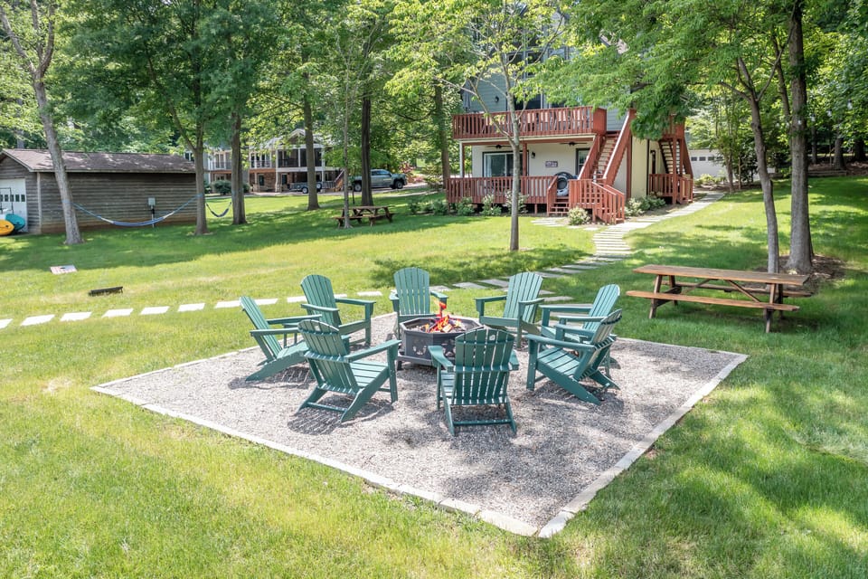Firepit area with Adirondack chairs - ideal for evenings by the lake