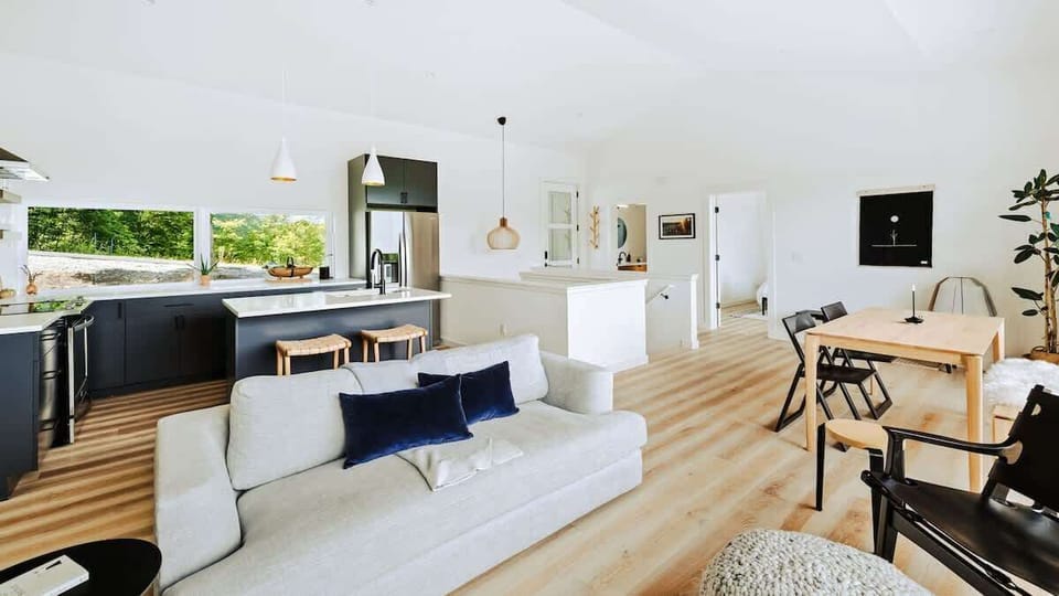 Clean lines, open space, and cozy textures. This Scandinavian-inspired great room is made for slow mornings, shared meals, and winding down.