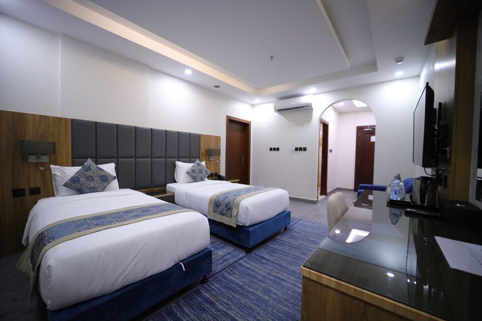 In-room safe, laptop workspace, blackout drapes, soundproofing
