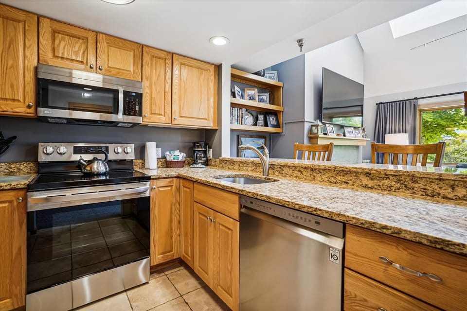 Modern Kitchen nicely stocked for your use.  Cook in style and take advantage on the evenings you stay in for home cooked meals.