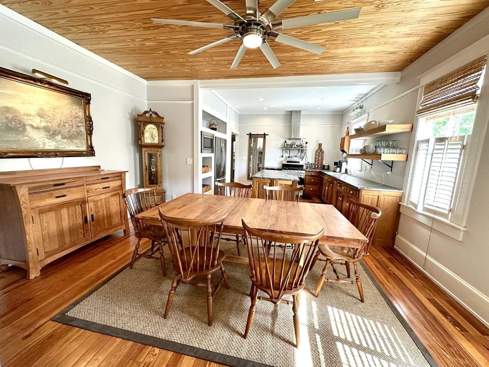 Dining open to Kitchen with Games in the Cupboard - Handmade Grandfather Clock in the corner