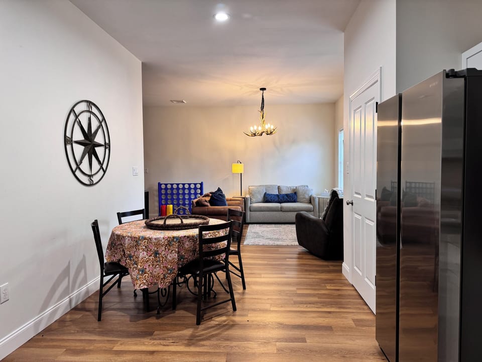 view from kitchen looking into dining area/living room