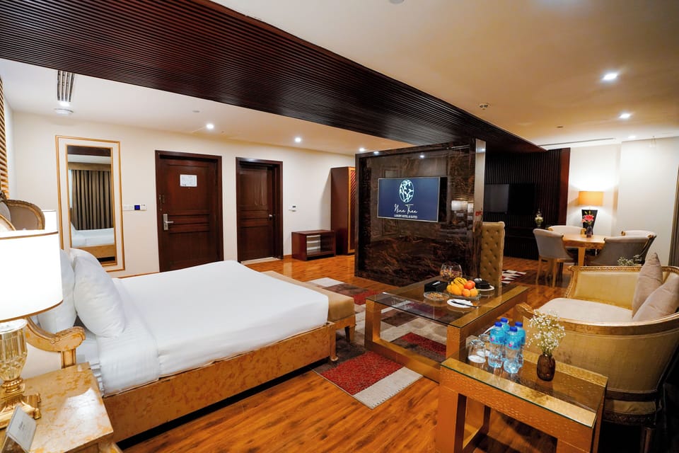 Premium Suite | Minibar, in-room safe, individually decorated, individually furnished