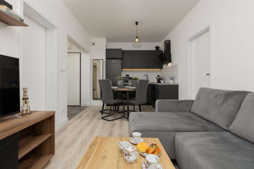 Enjoy your favorite shows on the flat-screen television in the elegant living area.