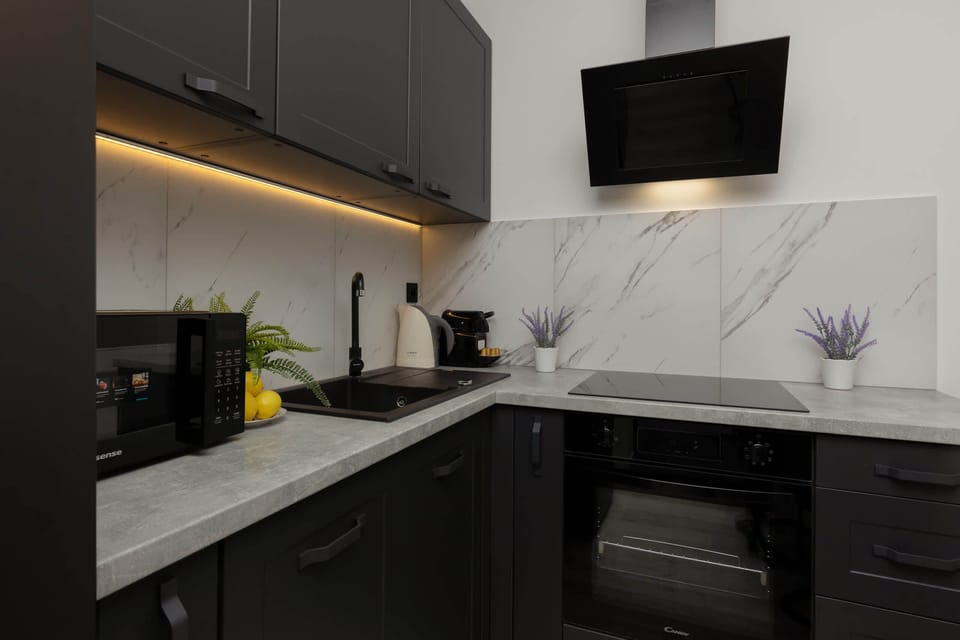 The fully equipped kitchenette includes everything you need for a home-cooked meal.