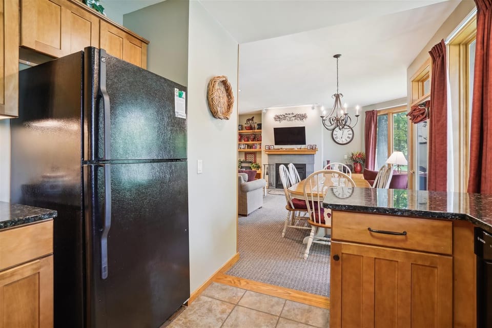 Open floor concept helps to bring the flow of this beautiful condo together.  Perfect when entertaining or preparing a meal for your family.