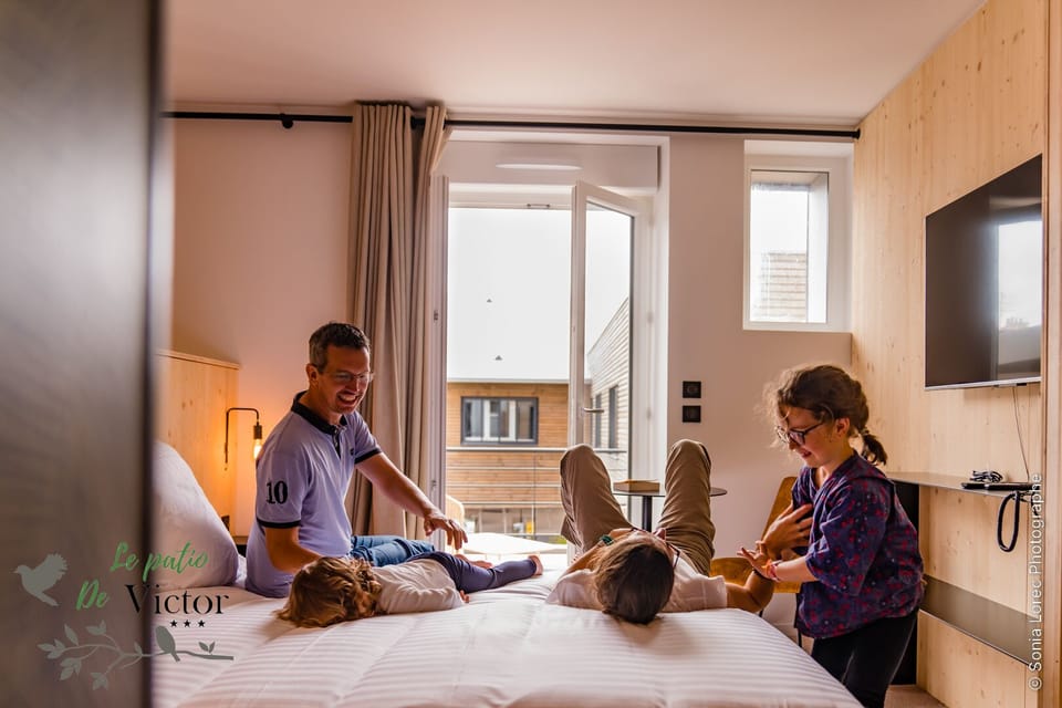 Family Quadruple Room, 2 Bedrooms, Kitchenette | Blackout drapes, iron/ironing board, free WiFi, bed sheets