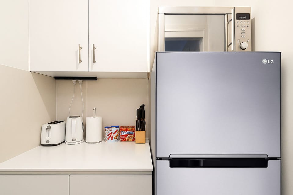 Kitchenette: Functional kitchenette for quick meal prep 