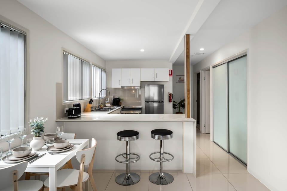 Dining Area: Integrated dining area within open living layout 
