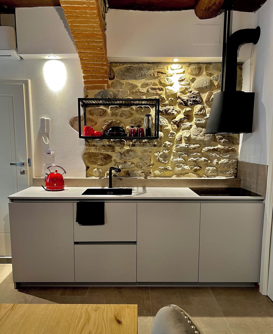 Romantic Suite, 1 King Bed, Non Smoking, City View | Private kitchen | Highchair