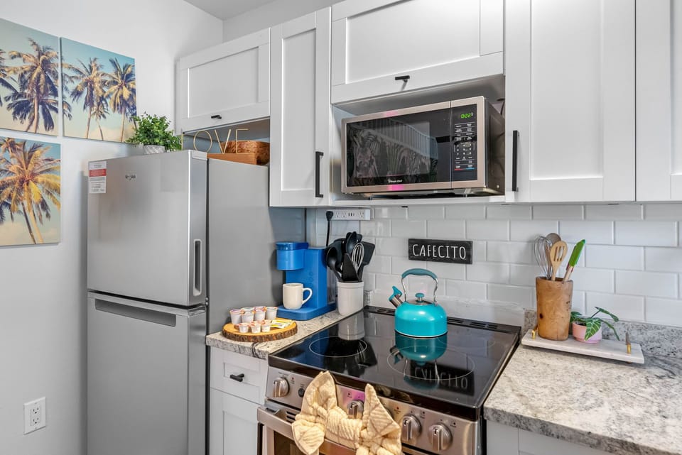 Create gourmet delights or simply savor your morning coffee – the kitchen is a complete functional space tailored to your every need.