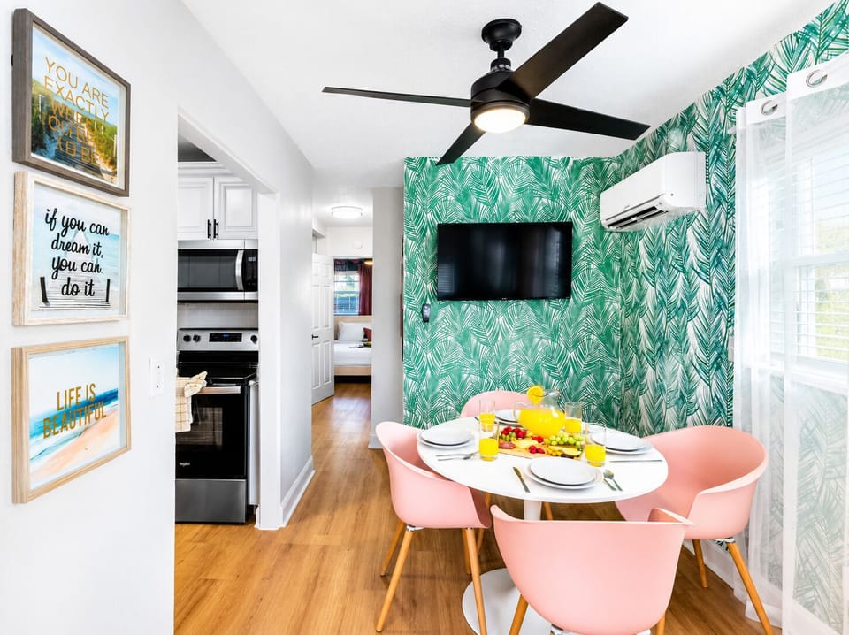 Gather around the stylish dining table for meals, morning coffee, or planning your next beach adventure. The open layout keeps everyone connected.