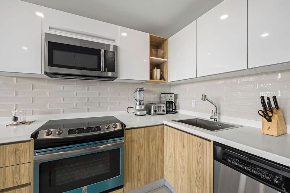 Your fully equipped kitchen has everything you need: modern appliances, sleek countertops, and all the essentials for whipping up meals just the way you like them.
