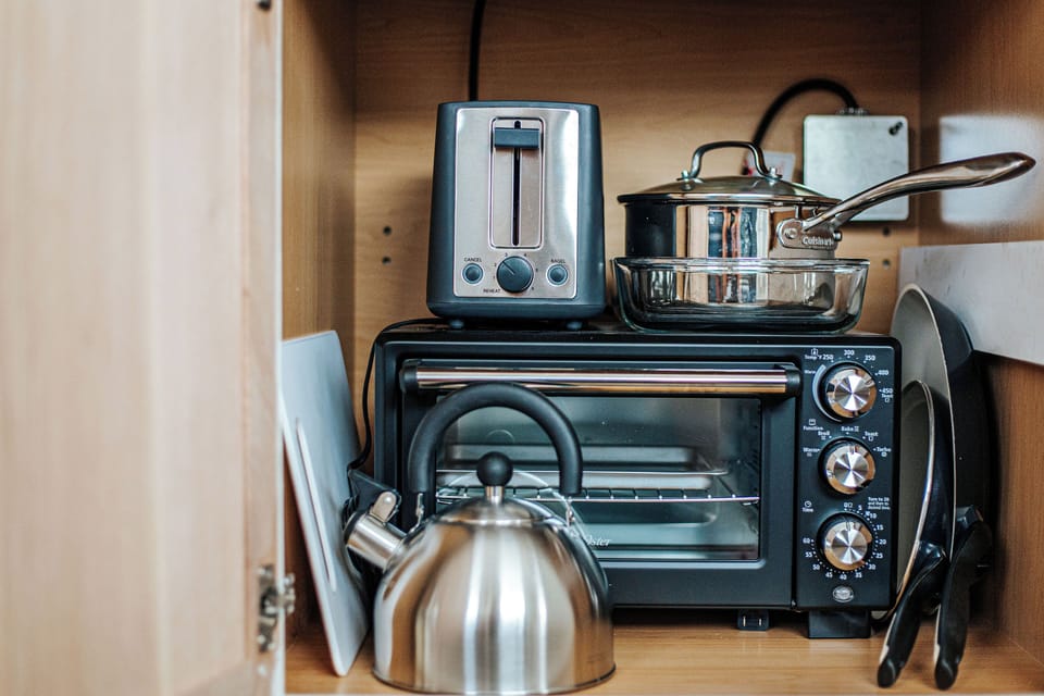 Equipped with pots/pans, toaster oven, toaster, tea kettle, stove pot & more