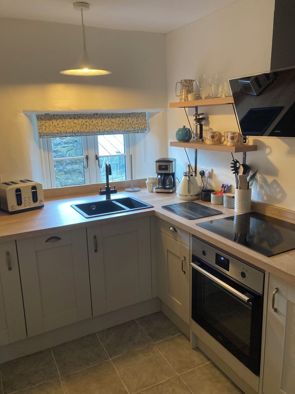Fully fitted kitchen including dishwasher, oven, hob, microwave, toaster, kettle
